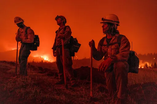 Markleeville, California, USA. 17th July, 2021. U.S. Forest Service firefighters monitor the Tamarack Fire just outside of the center of Markleeville. (