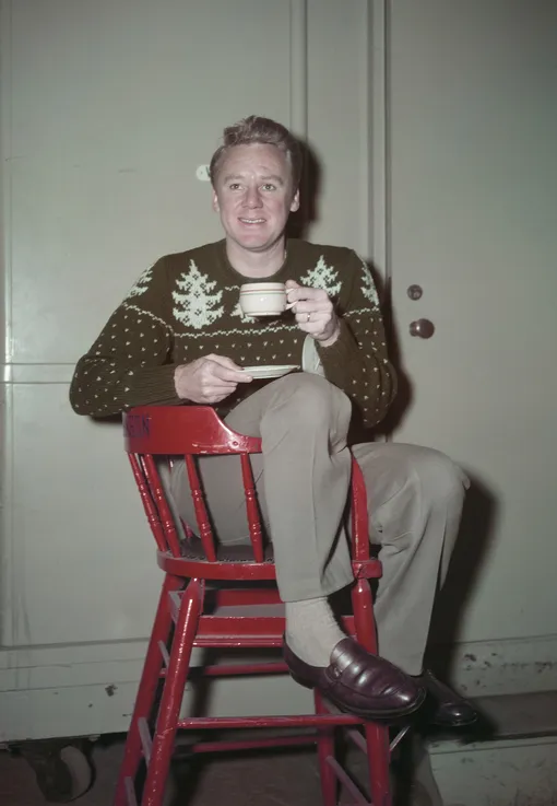 American actor Van Johnson (1916 — 2008) wearing a Christmas sweater, circa 1950. (Photo by )