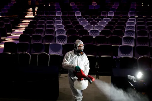DATE IMPORTED:March 06, 2020A worker sprays disinfectant inside the theatre before the Miss International Queen beauty pageant for transgender women in Pattaya, Thailand March 7, 2020. REUTERS/Soe Zeya Tun TPX IMAGES OF THE DAY