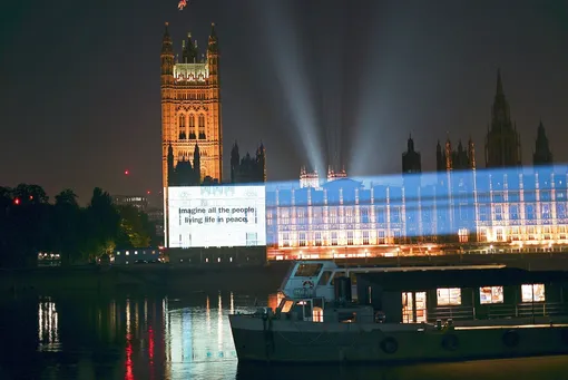 A lyric of John Lennon's and Yoko Ono's song «Imagine» is projected on Houses of Parliament buildings to mark 50 years since the late Beatle released the famed track and album, in London, U.K., Sept. 7, 2021.