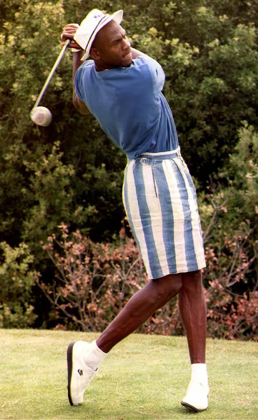 LA TURBIE, FRANCE — JULY 22: U.S. basketball player Michael Jordan swings a golf club at the Monte-Carlo Golf Club 22 July, 1992. Jordan will participate in the 25th Olympic Games in Barcelona. КРЕДИТ