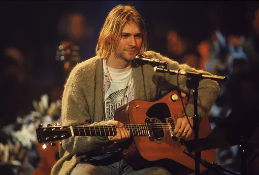American singer and guitarist Kurt Cobain (1967 — 1994), performs with his group Nirvana at a taping of the television program 'MTV Unplugged,' New York, New York, Novemeber 18, 1993. (Photo by )