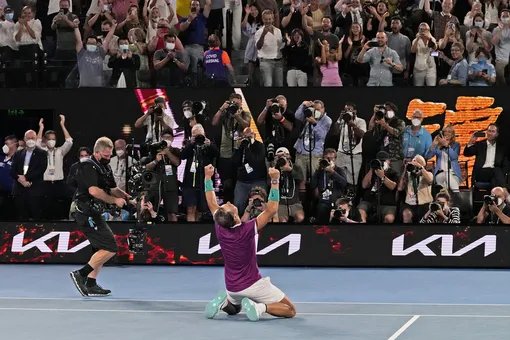 APTOPIX Rafael Nadal of Spain celebrates after defeating Daniil Medvedev of Russia during the men's singles final at the Australian Open tennis championships in Melbourne, Australia, Monday, Jan. 31, 2022. (AP Photo/Simon Baker)