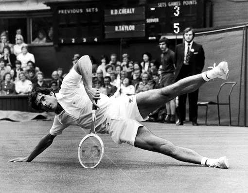 June 25, 1974 Roger Taylor strikes a pose as he falls to the floor following a point (Photo by (Edited)
