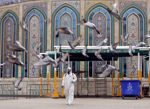 DATE IMPORTED:March 15, 2020A worker in a protective suit sprays disinfectants near Imam Abbas shrine as a precaution against the coronavirus, following the outbreak, in the holy city of Kerbala, Iraq March 15, 2020.REUTERS/Abdullah Dhiaa Al-deen TPX IMAGES OF THE DAY