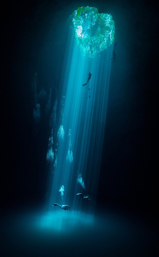 Water second place: Joram Mennes, MexicoThree levels of leisure: swimmers, freedivers and divers enjoy their respective sport and recreational activities in a fresh water mass known locally as the CenotesPhotograph: Joram Mennes/TNC photo contest 2021