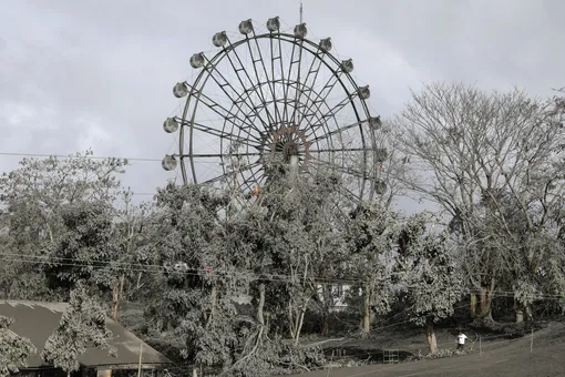 A ferris wheel is covered with volcanic ash in a park in Tagaytay City, Philippines, January 14, 2020. REUTERS/Eloisa Lopez