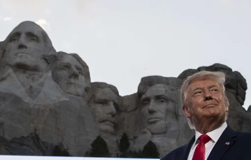 President Donald Trump smiles at Mount Rushmore National Memorial