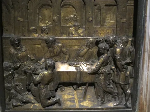 Донателло. Пир Ирода. 1427-1428. Рельеф купели в баптистерии Сиенского собора