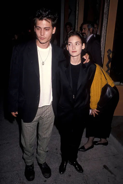 WESTWOOD,CA — SEPTEMBER 24: Actor Johnny Depp and actress Winona Ryder attend the «Pacific Heights» Westwood Premiere on September 24, 1990 at Avco Center Cinemas in Westwood, California. (photo by )