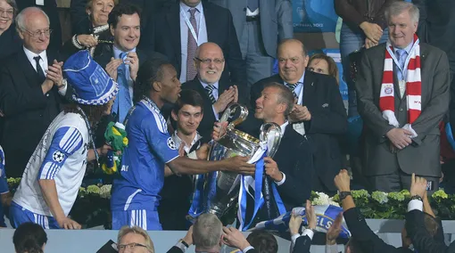 19.05.2012. Munich, Germany. Chelsea's Didier Drogba And Club Owner Roman Abramovich (C-R) Celebrate With The Trophy After The UEFA Champions League Soccer Final Between FC Bayern Munich And FC Chelsea At Football Arena M In Munich, Germany, 19 May 2012.