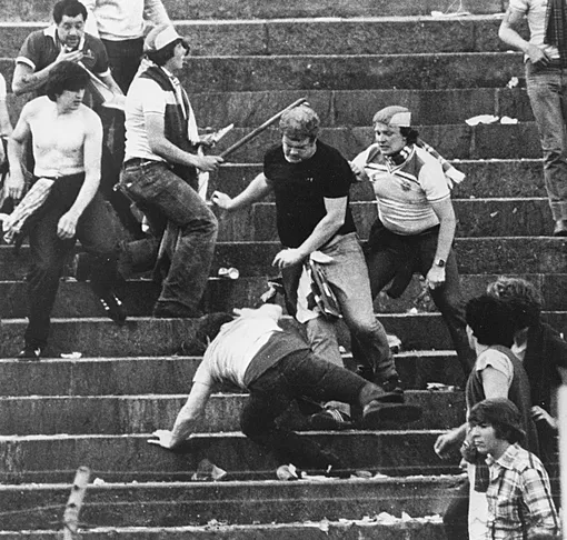 June 1981: British football fans riot during a World Cup football match in Basle, in which Switzerland defeated England by two goals to one. (Photo by Keystone/Getty Images)