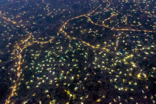 Dusk at Rohingya Refugee Camp | Urban CommendedKutupalong refugee camp is the world’s largest refugee camp. It is in Ukhia, Cox’s Bazar, Bangladesh, and is inhabited by Rohingya refugees who fled from persecution in neighbouring Myanmar. Millions of Rohingya refugees live here in huts and tentsPhotograph: Azim Khan Ronnie/Drone Photography Awards 2021