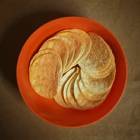 Производители чипсов и печенья решили увеличить упаковки из-за пандемии