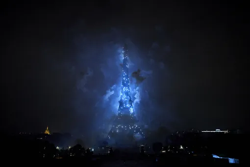 Fireworks light up the Eiffel Tower as part of the annual Bastille Day celebrations on July 14, 2021 in Paris, France. The fireworks display was designed around the theme of ‘Freedom’ after more than a year of France living with the Covid-19 pandemic. On Monday French President Emmanuel Macron announced new restrictions to combat the rise of the Delta variant in France which has led to the reduction of some Bastille Day celebrations.