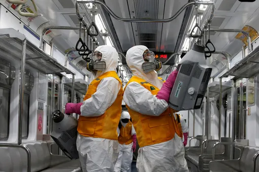 DATE IMPORTED:March 11, 2020Employees from a disinfection service company sanitize a subway car depot amid coronavirus fears in Seoul, South Korea, March 11, 2020. REUTERS/Heo Ran TPX IMAGES OF THE DAY