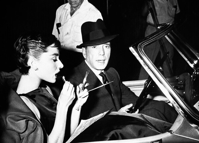 Одри Хепберн и Хамфри Богарт на съемках